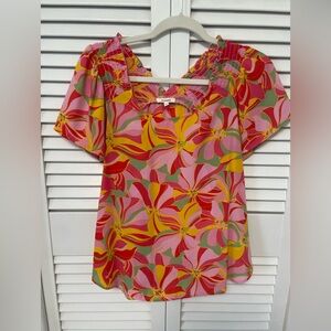 Cute top perfect for jeans dress up or down.